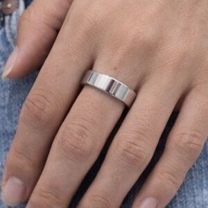 Brand New!! Size 9 1/2 Stainless steel plated beveled edge band/ring